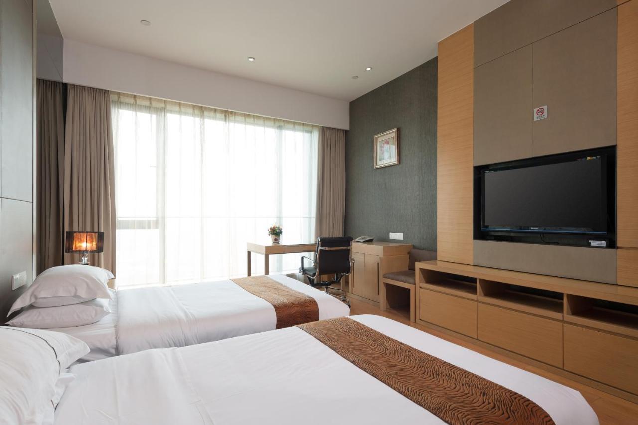 Yicheng Pazhou Poly World Trade Centre Apartment Cantón Exterior foto